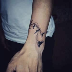 Blackwork birds tattoo on a wrist - Baan Khagee Tattoo Chiang Mai   #blackwork #blackworktattoo #wristtattoo #btattooing #blacktattooing #blacktattooart #btattooing #blackink #onlyblackart #inkstagram #bangkoktattoo #Bangkok #tattoobangkok #Tattoodo #tatuagem #inked #inkedmag #tattooistartmag #tattooing #tattoochiangmai #tattoostudiochiangmai