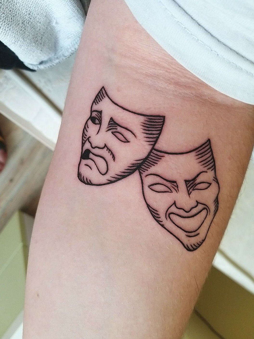 Drama mask tattoo | Small tattoos for guys, Dainty tattoos, Simple tattoos