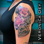 Locket with roses tattoo by Veronica Dey at vicious vanity ink tattoo studio