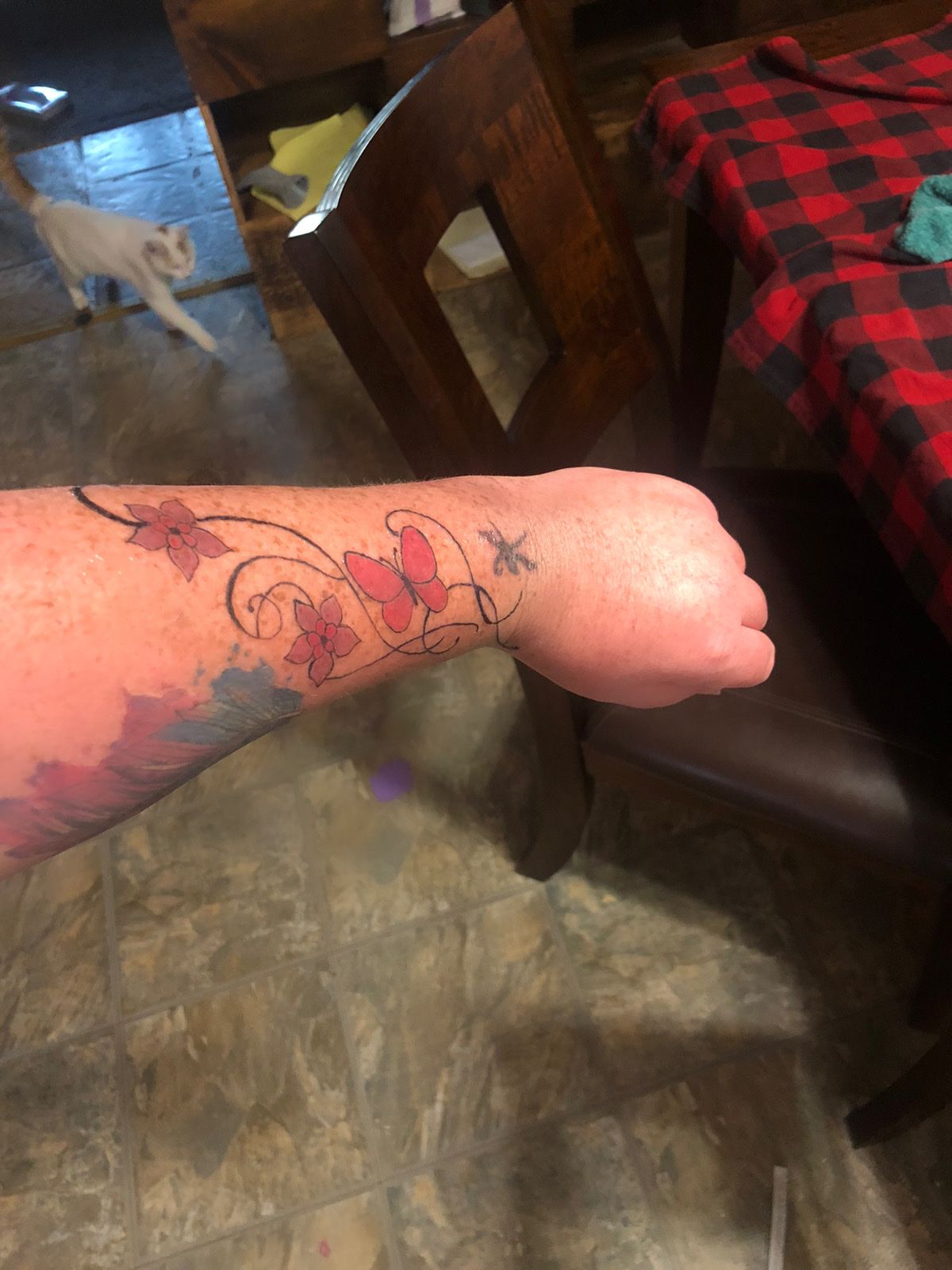 Is it normal for the tattoo outlining to bleed out under the skin? - Quora