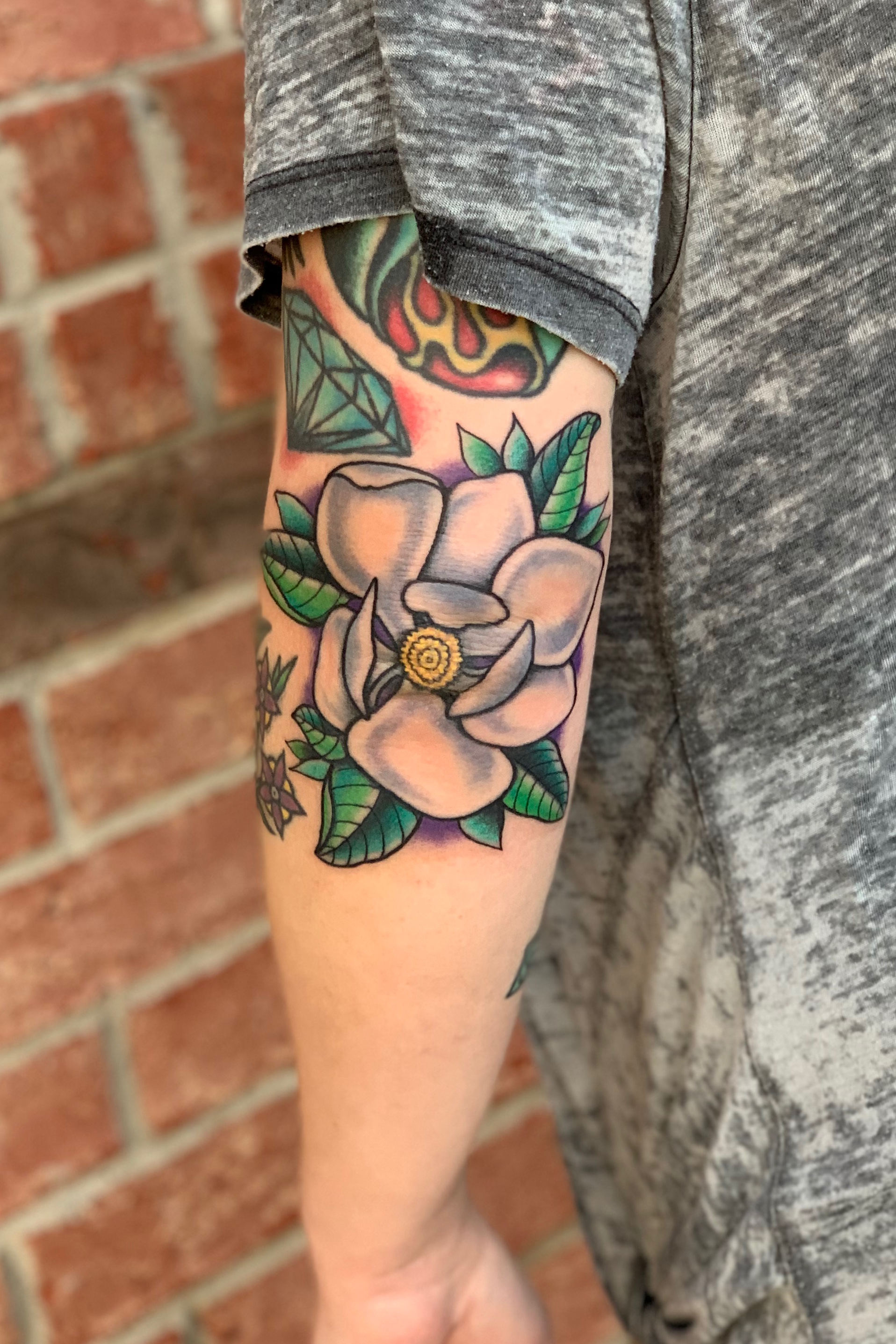 Magnolia Tattoo Meaning A Blossoming Symbol of Beauty and Strength   Impeccable Nest