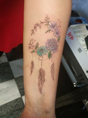 Purple and blue flowers with feathers & leaves 