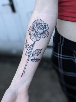 Rose tattoo by Binx. 
