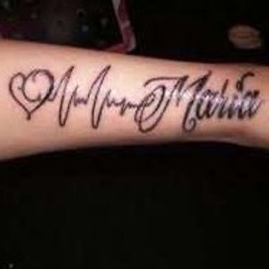 I want my aunt name on my arm like this picture her name is Tracy 