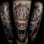 Samurai mask ronin. Arm tattoo. Black and Grey with color