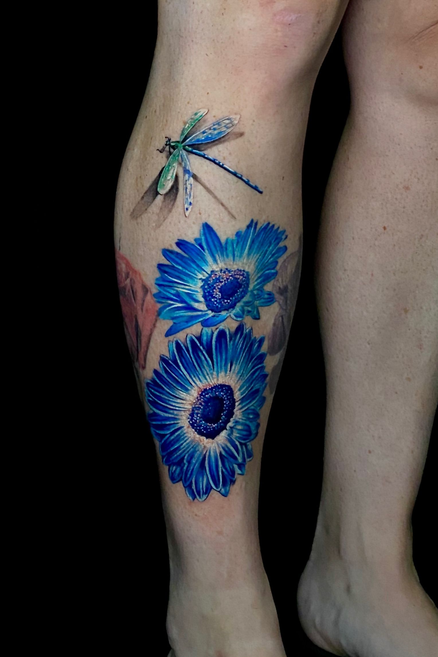 Raven Tattoo - Added the blue cosmo flowers tonight to... | Facebook