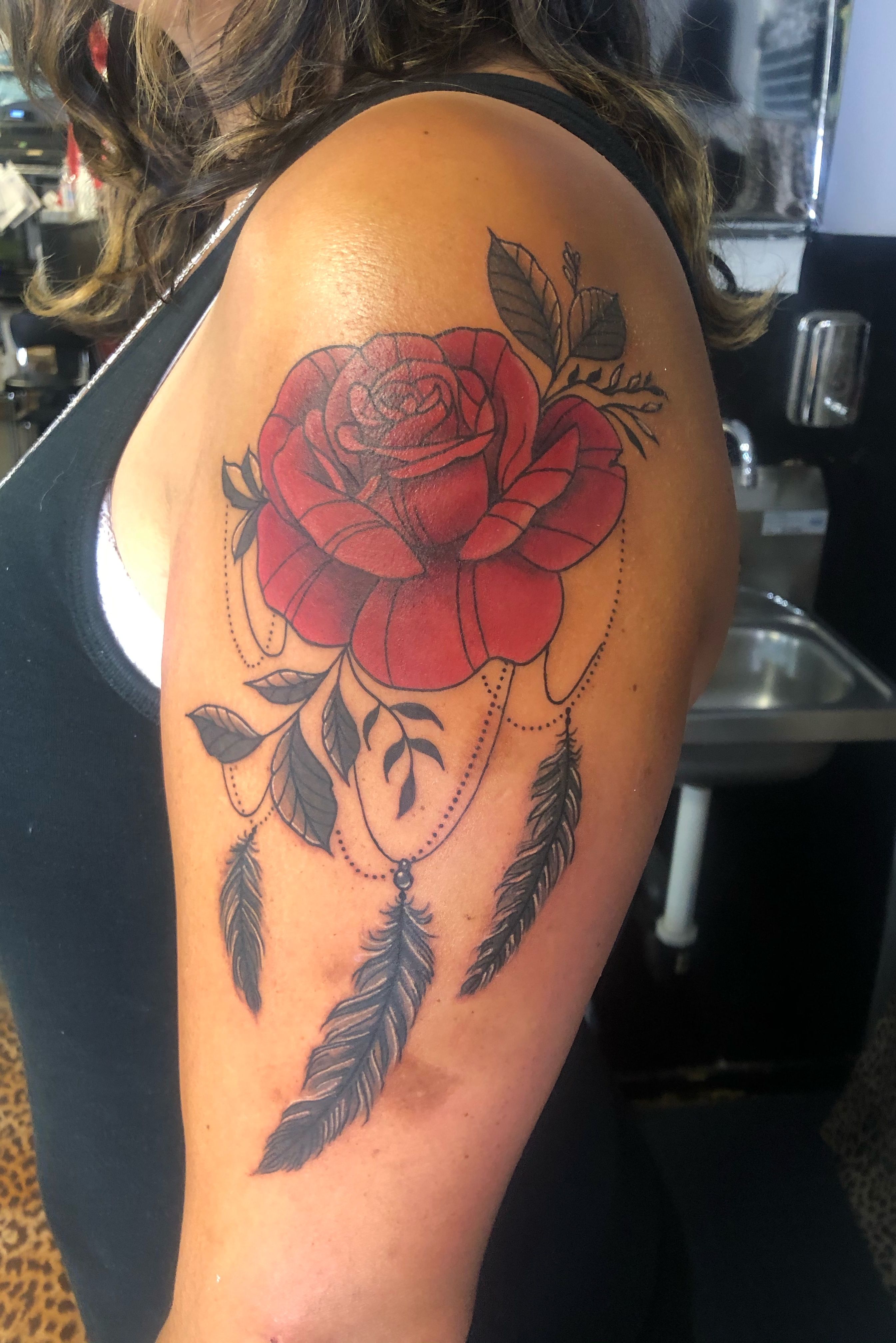 Blue Rose And Feather Infinity Tattoo On Leg