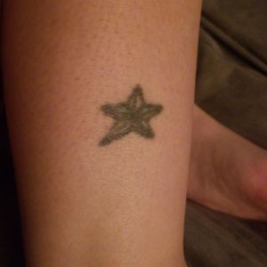 Hollow nautical starFirst tattoo, home done stick and poke done when I was 16