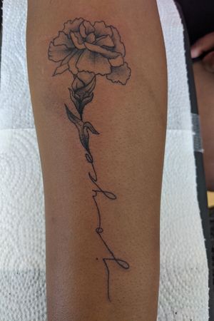 Name flower tattoo.