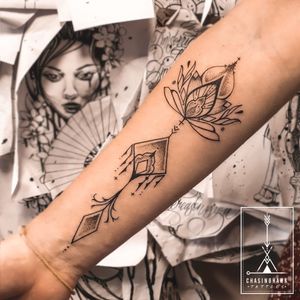 Lotus & Arrow Forearm Tattoo