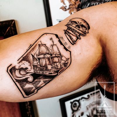 Ship In A Bottle Tattoo - This is actually apart of a much larger tattoo and is the first step as the next session I will be adding the line work for the Octopus holding the bottle,(as seen on the top and the missing connecting bottle bits on the bottom left - tentacles). #shiptattoo #shipinabottle #nautical #skull #blackwork #wave 