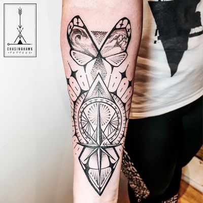 Butterfly Compass Tattoo - Customer wanted to include waves and mountains in the butterfly wings with a nautical compass star/sun effect. #butterflytattoo #butterfly #waves #compass #blackwork 
