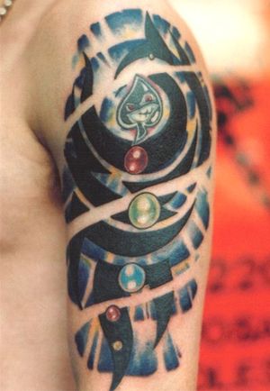 Tribal colour mix tattoo by Mike