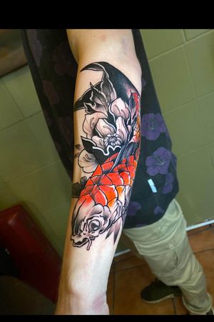Koi fish with flower
