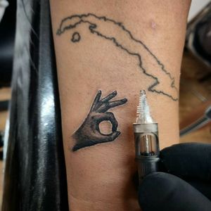 Micro tattoo by artist Mark Strong