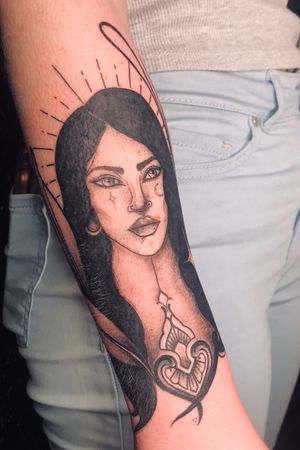 Tattoo by Sacred Art Tattoo & Piercing