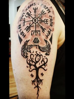 Nordic Tattoo:Top section: runic words "honor the Gods - Love your wife. interior the runes: Vegvisir (old nordic compas)Middle section: Walknot (Odin's knot of 3 combined triangles), Hugin and Munin (Odin's ravens)Below section: Ygdrasil (Tree of life), 2 runes J + J (1st letters of my wife's and my name)Artist: Johnny Black, ROMANIA, (guest tattoo artist) Studio: NH-INK, Mario Lavorato, Neheim, GERMANY(C) 07-2020