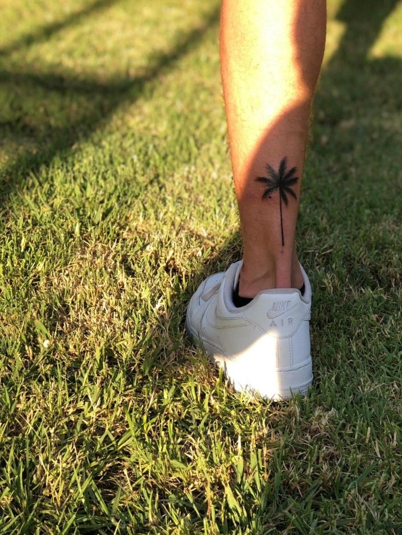 Small palm tree on the inner ankle done by Ian Anderson  Palm tree tattoo  ankle Tree tattoo ankle Palm tree tattoo