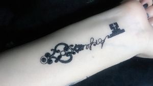 Key name tattoo