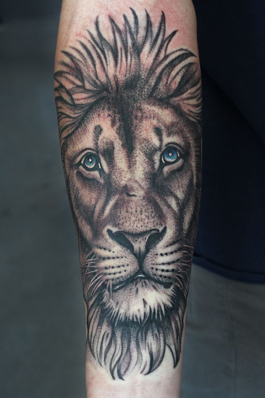 Tattoo uploaded by Jordan Matchin • Realistic lion with blue eyes • Tattoodo