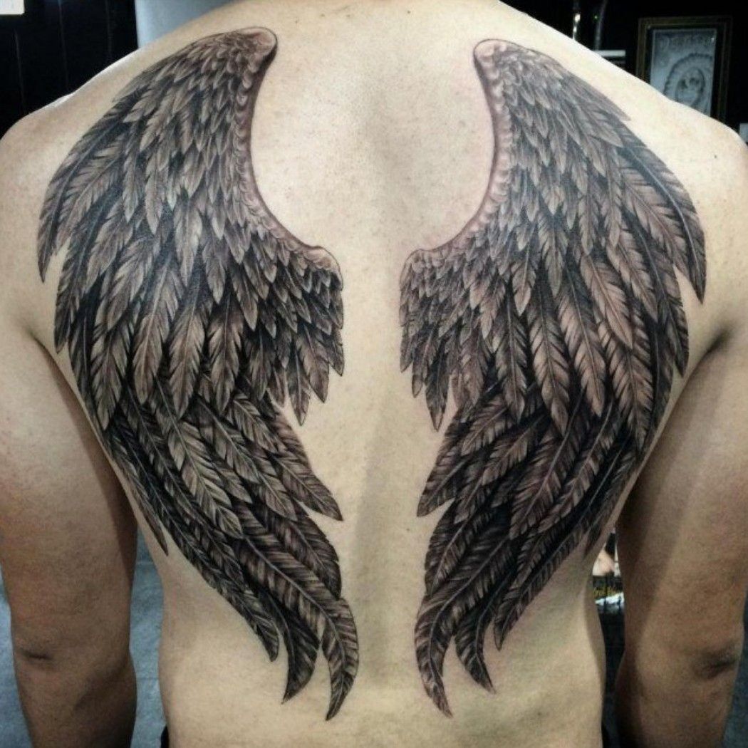 Black Ink Angel Wings Tattoo On Back