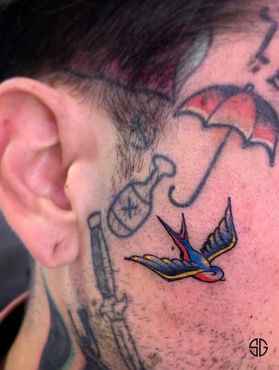 • Swallow • tiny traditional face piece for our friend @london_boy_lou 👊🏼 by our resident @oscar.ls.tattooist For bookings and info: •🌐 https://southgatetattoo.co.uk/booking/ •📧 info@southgatetattoo.co.uk •📱07456415895‬(WhatsApp only) ⚡️ ⚡️ ⚡️ #swallow #swallowtattoo #facetattoo #traditionalswallow #southgatetattoo #northlondon #london #sg #customtattoo #SGTattoo #londontattoo #northlondontattoo