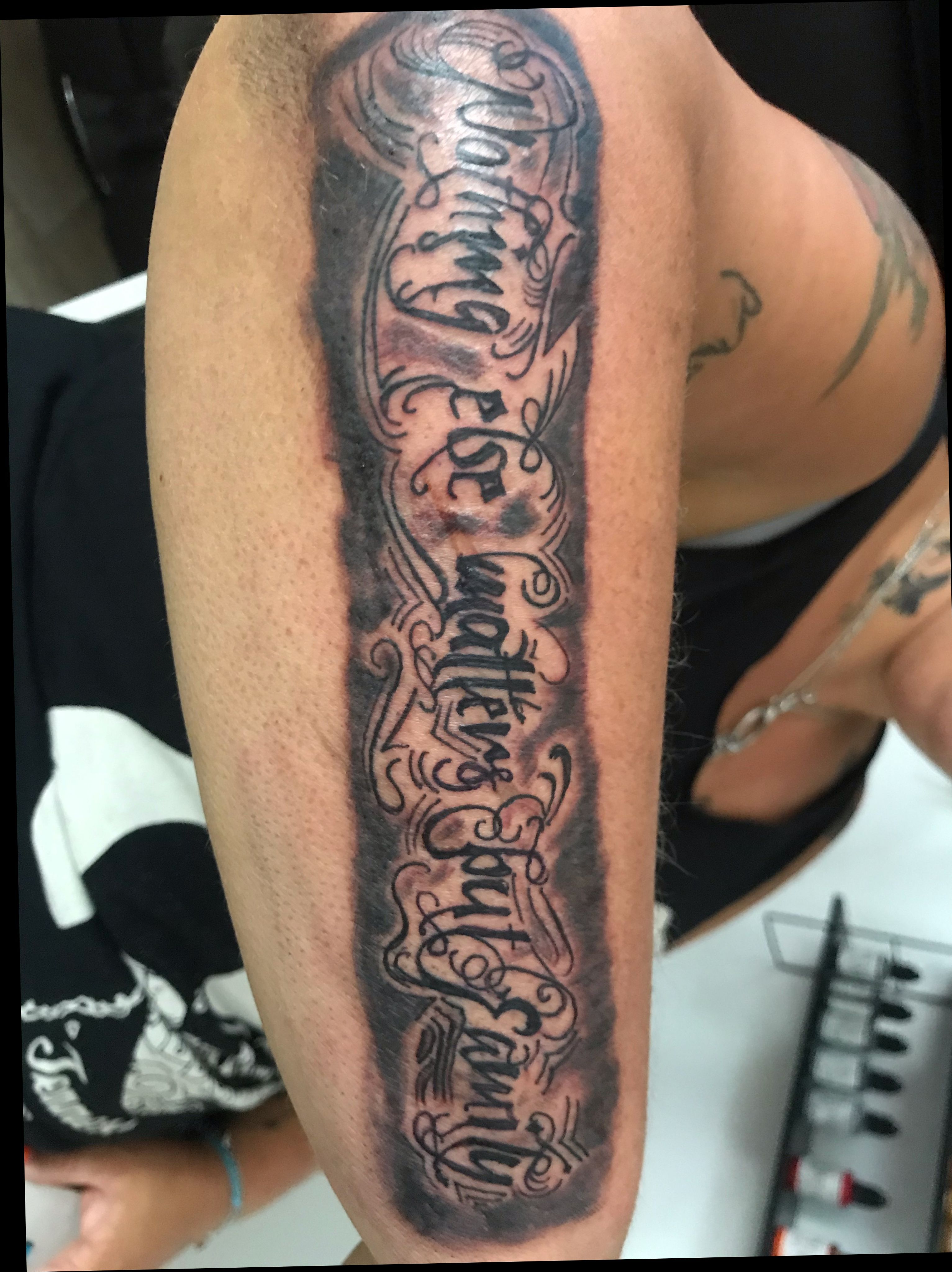 Family script with roses  Rose tattoo on arm Arm tattoos for guys Tattoos  for guys