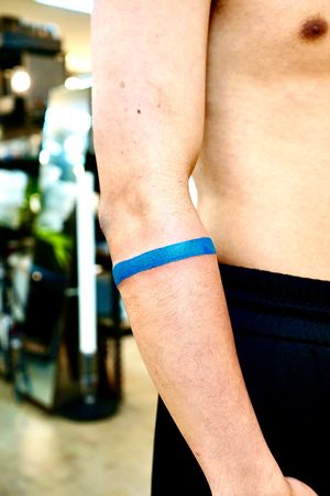 Blue color armband tattoo