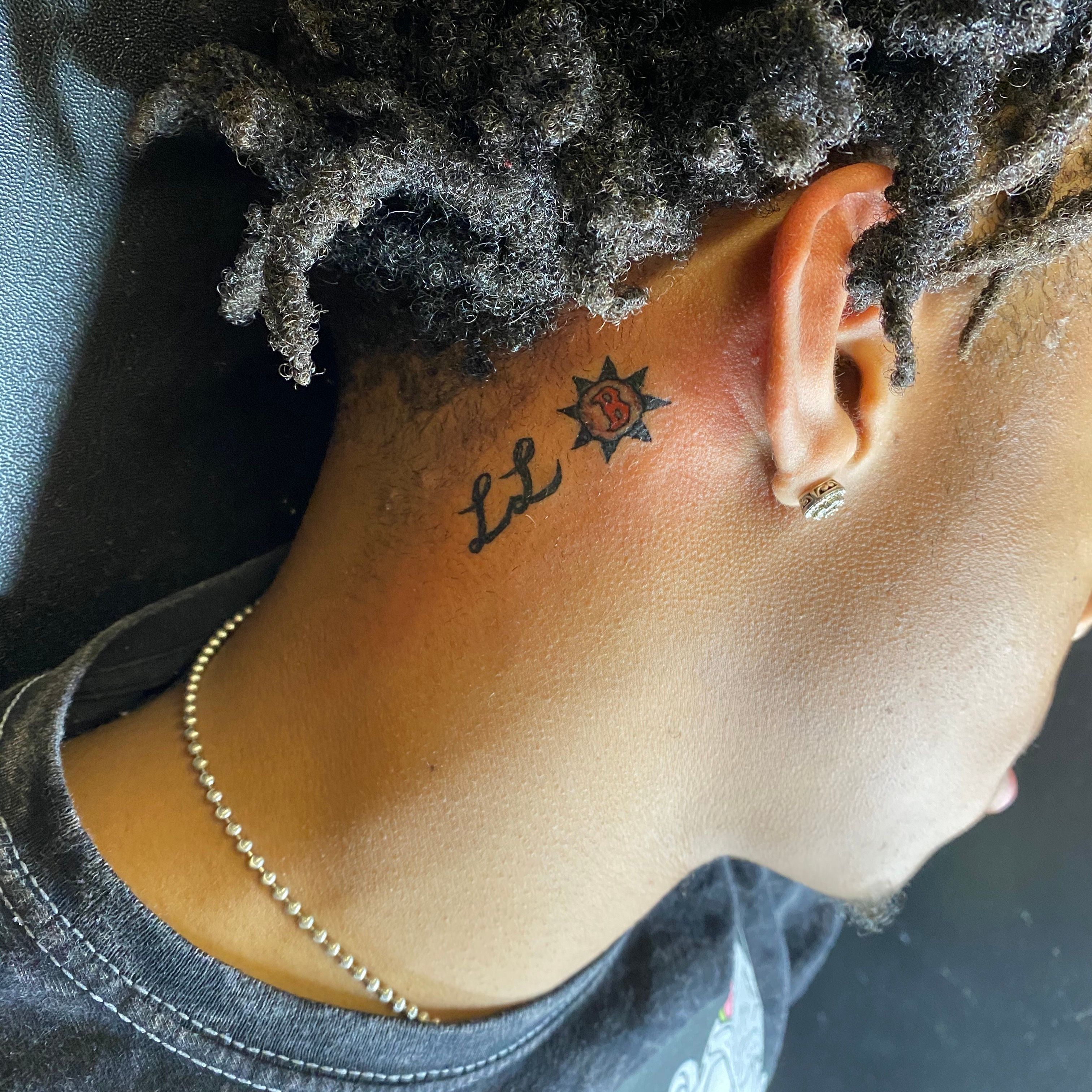 My boyfriend got my name tattooed behind his ear  everyone says the same  thing but I dont care  The Sun