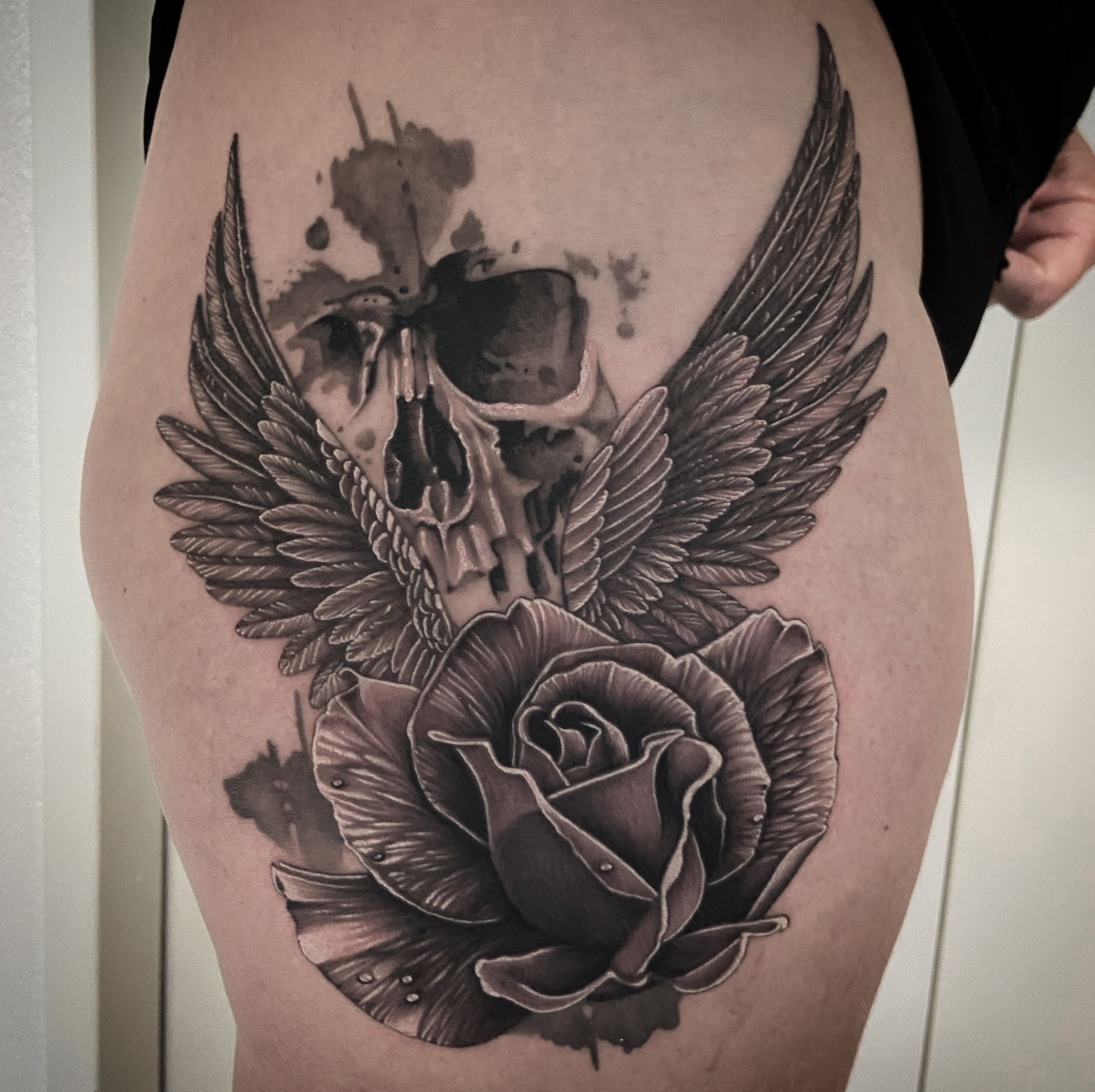 Tattoo of Skulls Roses Flowers