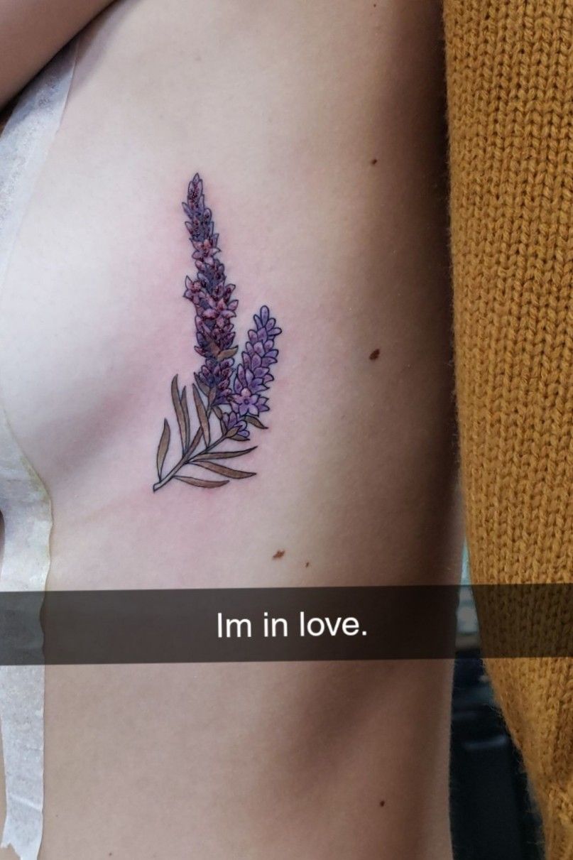 Fine line flower tattoo on the side boob