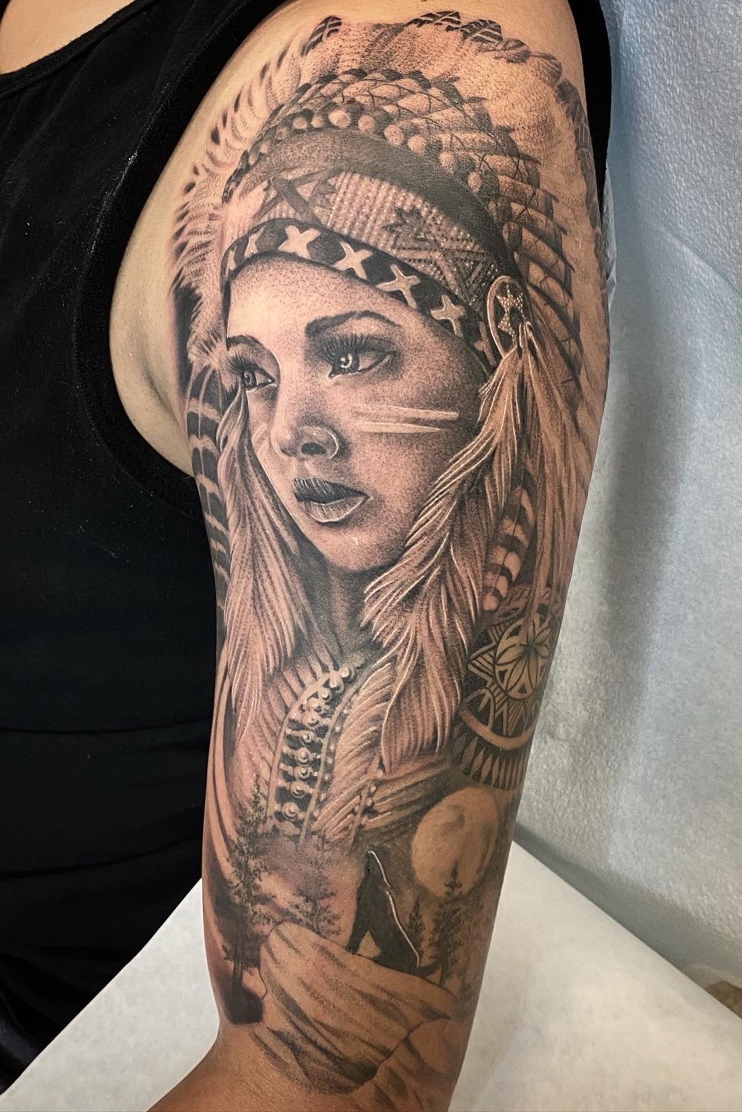 Tattoo uploaded by Justin JP Param • Native American half sleeve for a  first timer. Looking to do more liner stipple shaded pieces. #peaces  #blackandgrey #nativetattoo #girlportrait #dankubin #v7 #empireinks  #dynamicink #tattoolovers #
