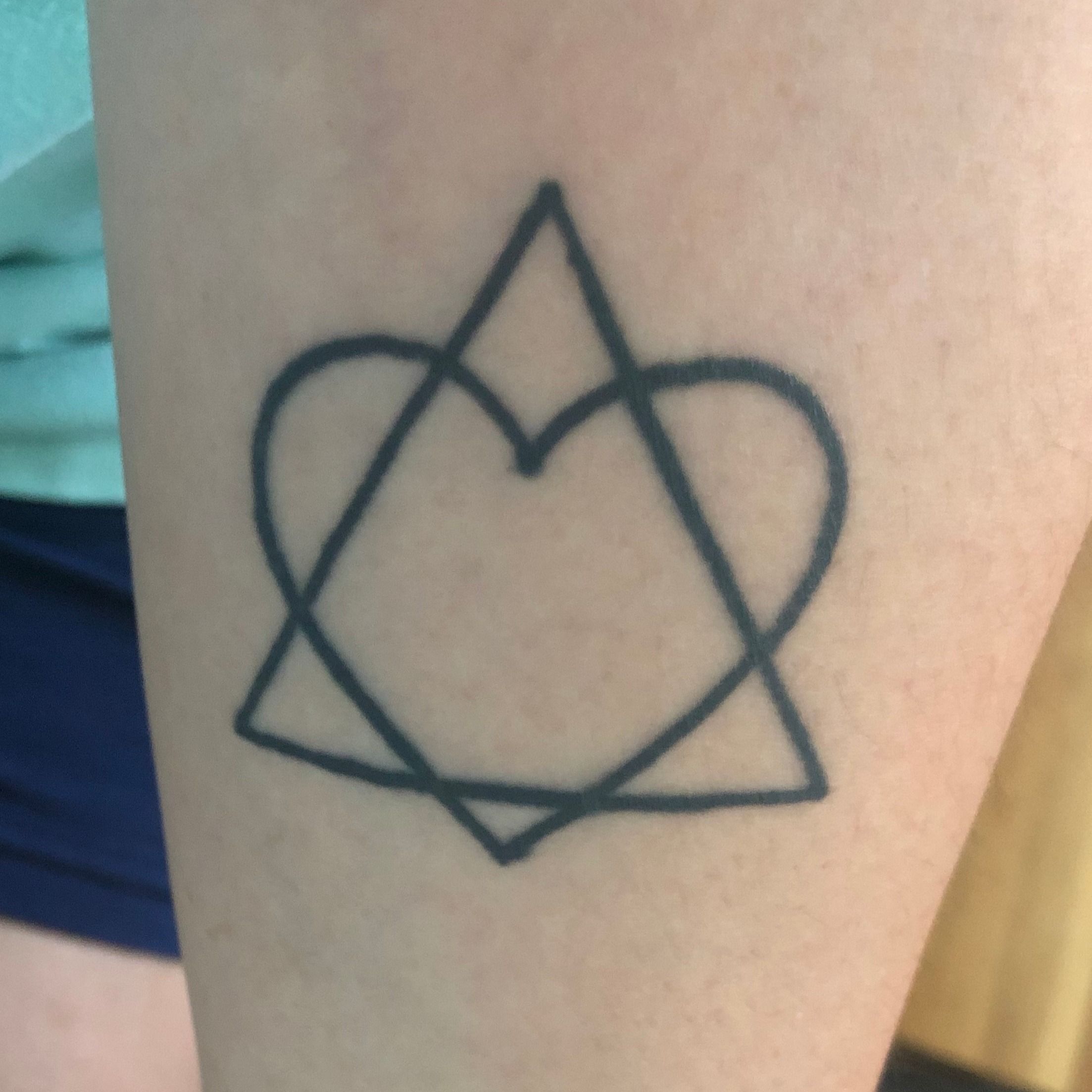Black Heart Tattoo Studio Ltd  Adoption symbol by Dallas today for Lisa  lower Tattoo not by us but will probably tidy it up for her    Supplies from tattooeverythingsupplies and