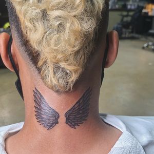 Angel wings on back of neck.  Small session