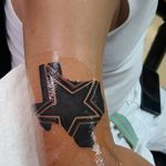 Texas with cowboys star tattoo