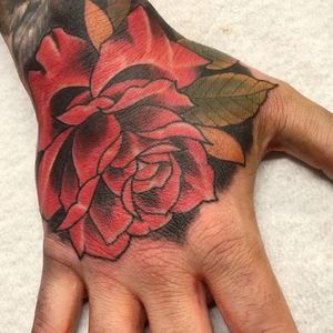 Fun job stopper! Trad rose design on the back of a hand 