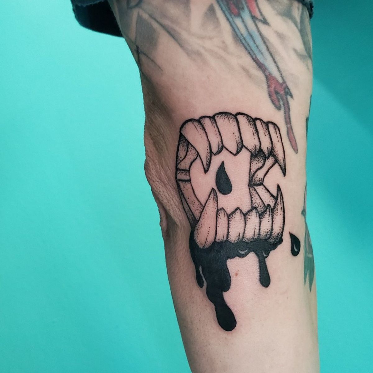 Tattoo uploaded by Marlee • Vampire teeth Halloween tattoo • Tattoodo