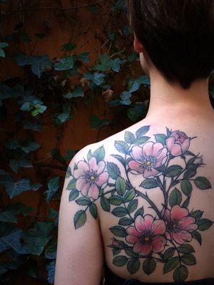 Beautiful floral design featuring cherry blossoms, expertly done by Aygul. Enhance your shoulder with this stunning artwork.