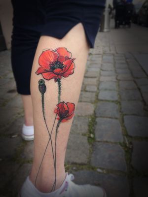 Beautiful floral design by Aygul, featuring a vibrant watercolor motif on the lower leg.