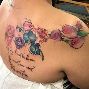 Scar coverup floral piece done in a specific watercolor/ illustrative style picked by the client. With specific flowers, colors, and quote. I love working on custom tattoos for people. 