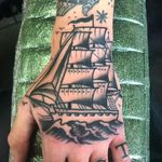 Clipper ship on the hand. 