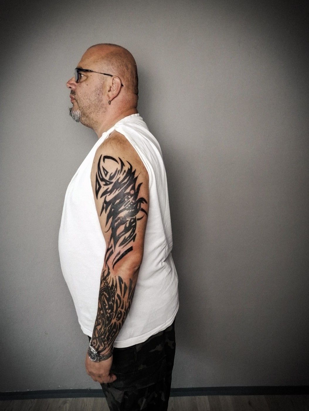 Trash Polka Tattoo on Arm Tattoo Idea