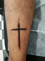 Cross on the back of lower leg 