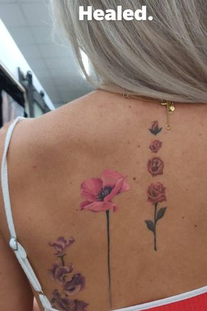 Healed full color, realism flower tattoo.