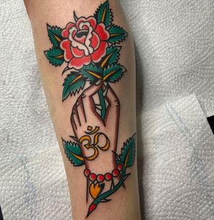Traditional tattoo by Marcos Ortega #MarcosOrtega #traditional #om #rose #hand