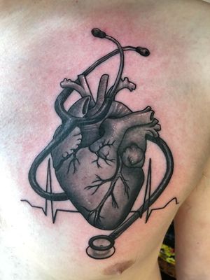 Sick ass heart tattoo. 