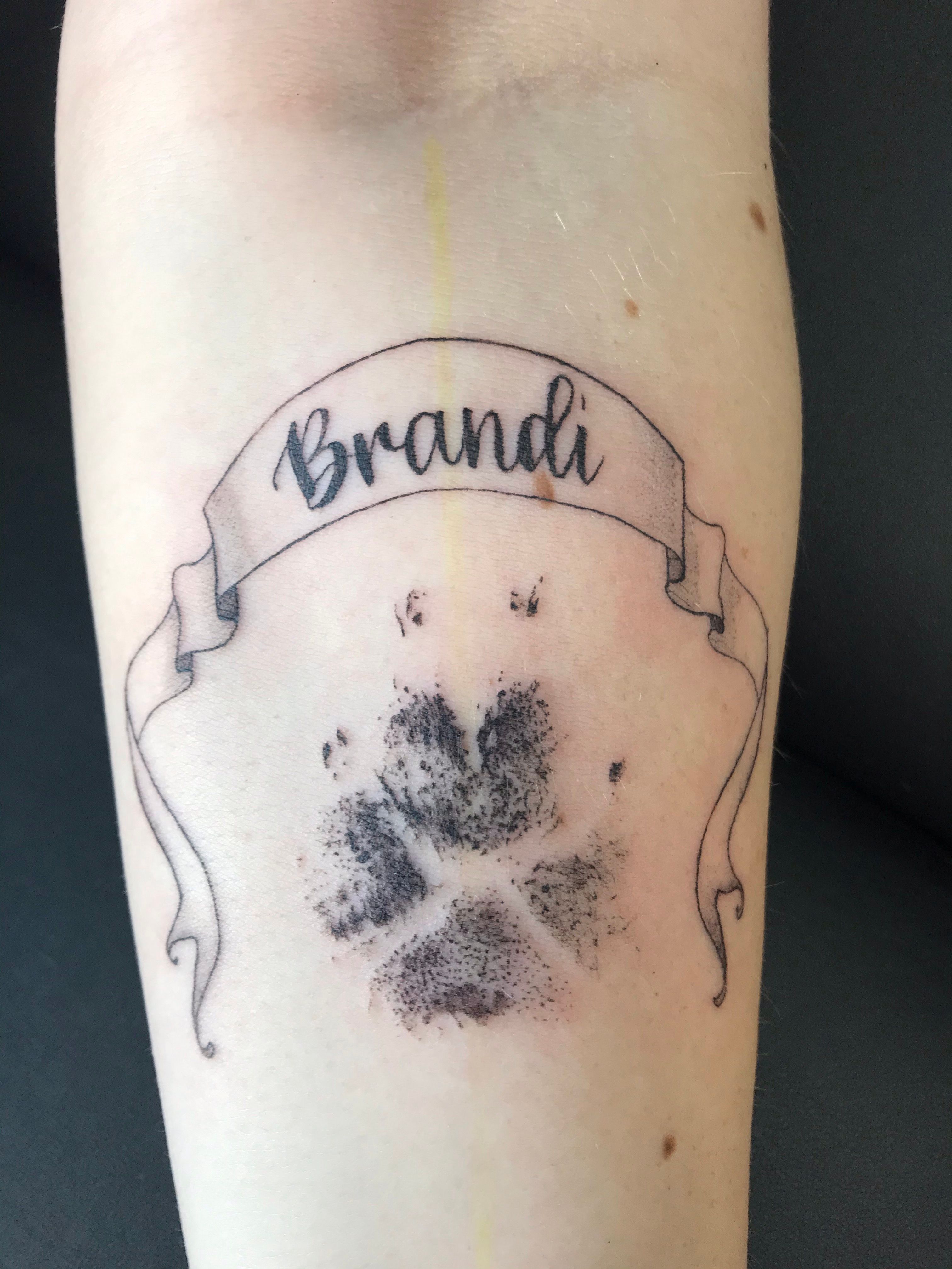I got a tattoo of my dogs pawprint. I took an ink pad and stamped his foot  onto paper. The artist didn't tatto… | Dream tattoos, Tattoos and  piercings, Love tattoos