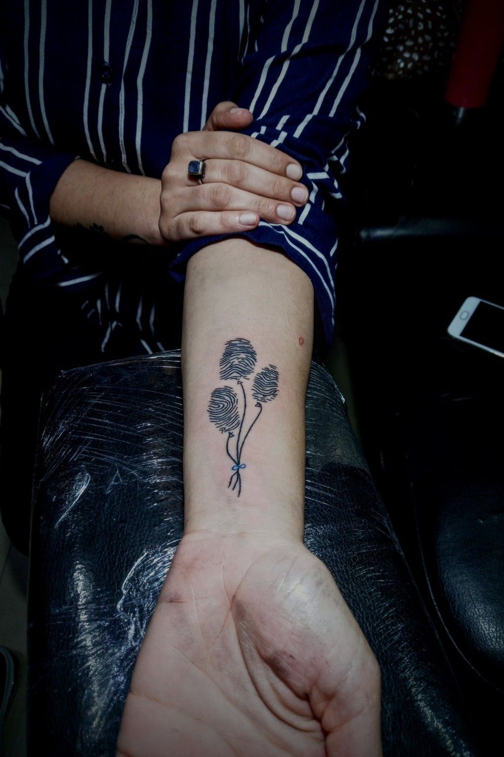 A fingerprint in the centre of a Sun flower  Fingerprint tattoos Pretty  tattoos Tattoos