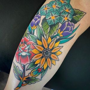 Flowers half sleeve by Andrew Shelton