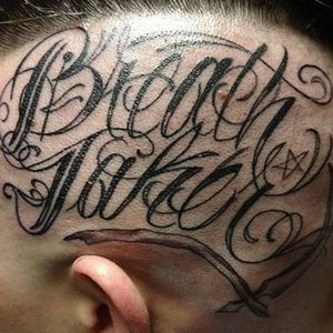 "Breath Taker" script tattoo by Micah Malone